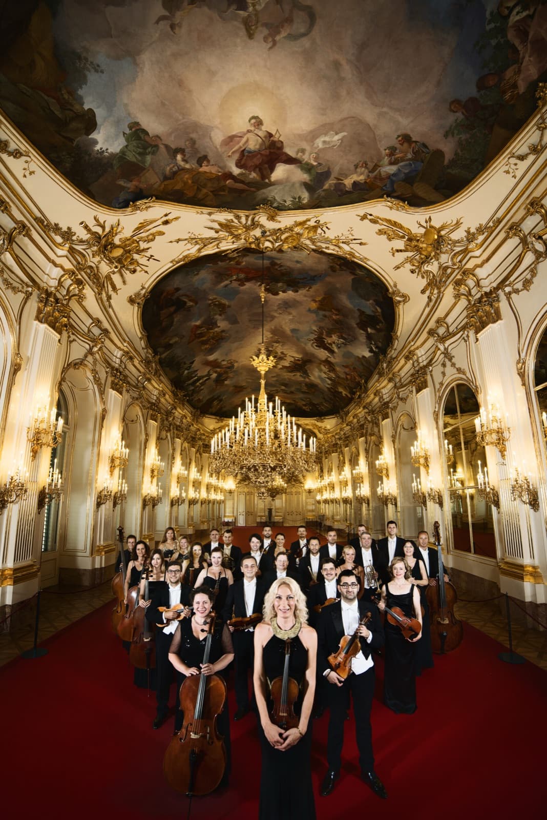 The Schönbrunn Palace Orchestra beneath the ceiling frescoes of the Great Gallery